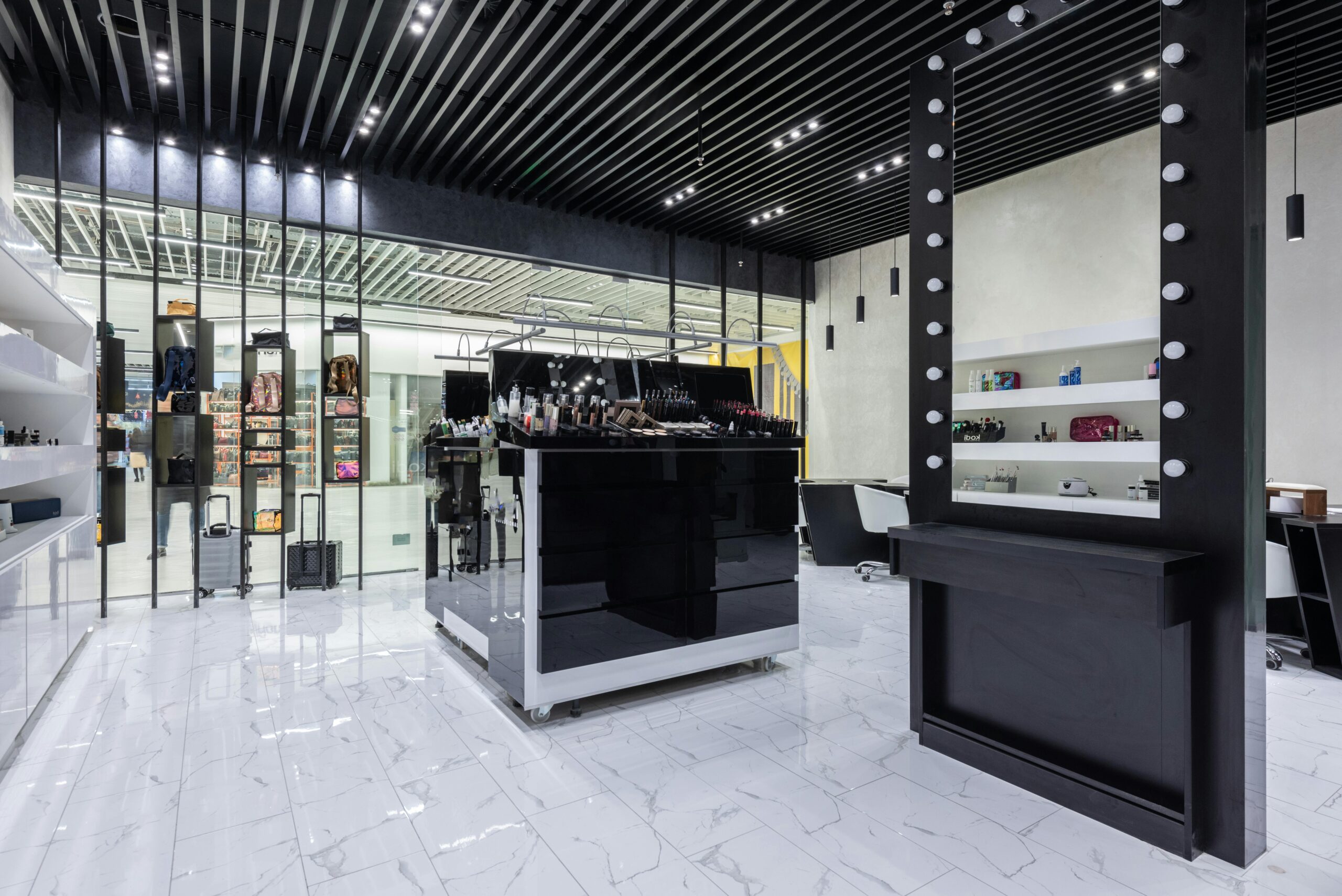 Sleek modern interior of a beauty store with cosmetics and chic decor.
