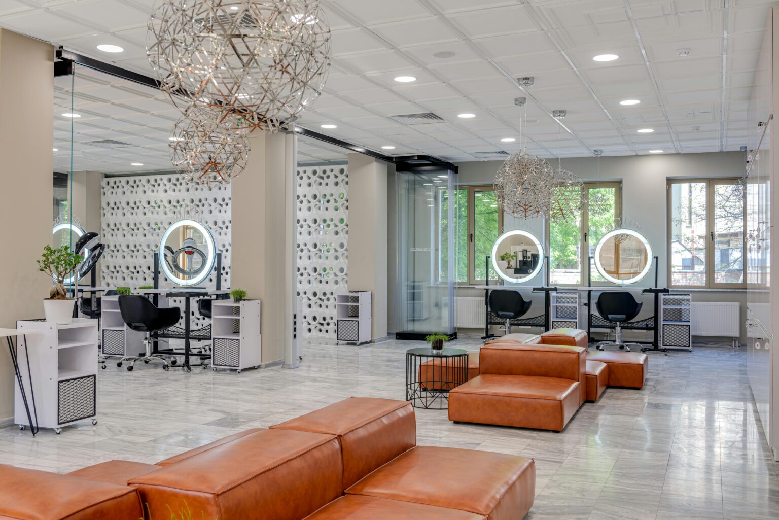 Stylish beauty businesses - beauty salon interior with minimalist decor, spacious seating, and contemporary lighting.