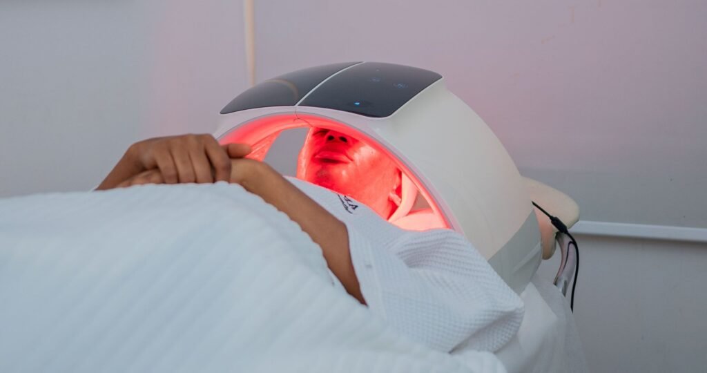A relaxing LED light therapy treatment at a modern spa in Abuja, Nigeria.