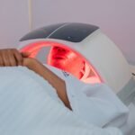 A relaxing LED light therapy treatment at a modern spa in Abuja, Nigeria.
